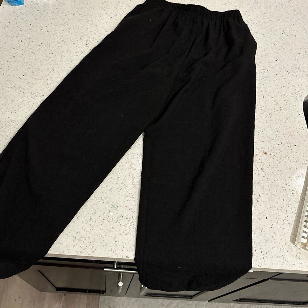 Christina James black pants